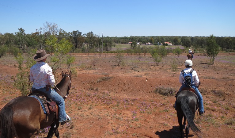 Riders and Inverary Homestead, Dthinna Dthinnawan National Park. Photo: Sean Forde/OEH