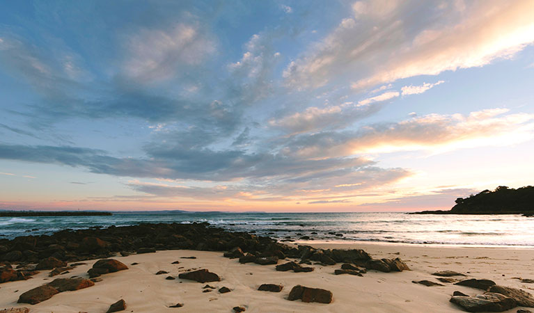 Sunset over a beach in Eurobodalla National Park. Photo: David Finnegan &copy; DPIE