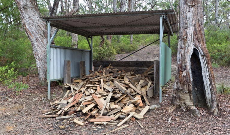 Wood piled up at Mulligans campground, Gibraltar Range National Park. Photo: seenaustralia.com.au