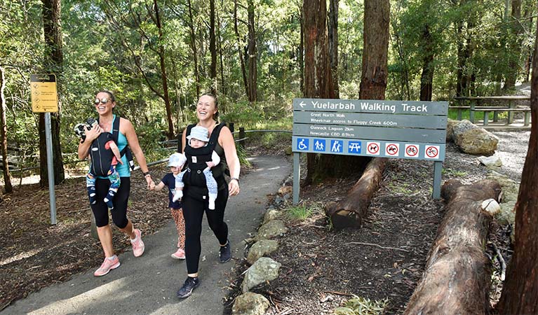 Parents walking with small children, Glenrock State Conservation Area. Photo: Adam Hollingworth &copy; DPE