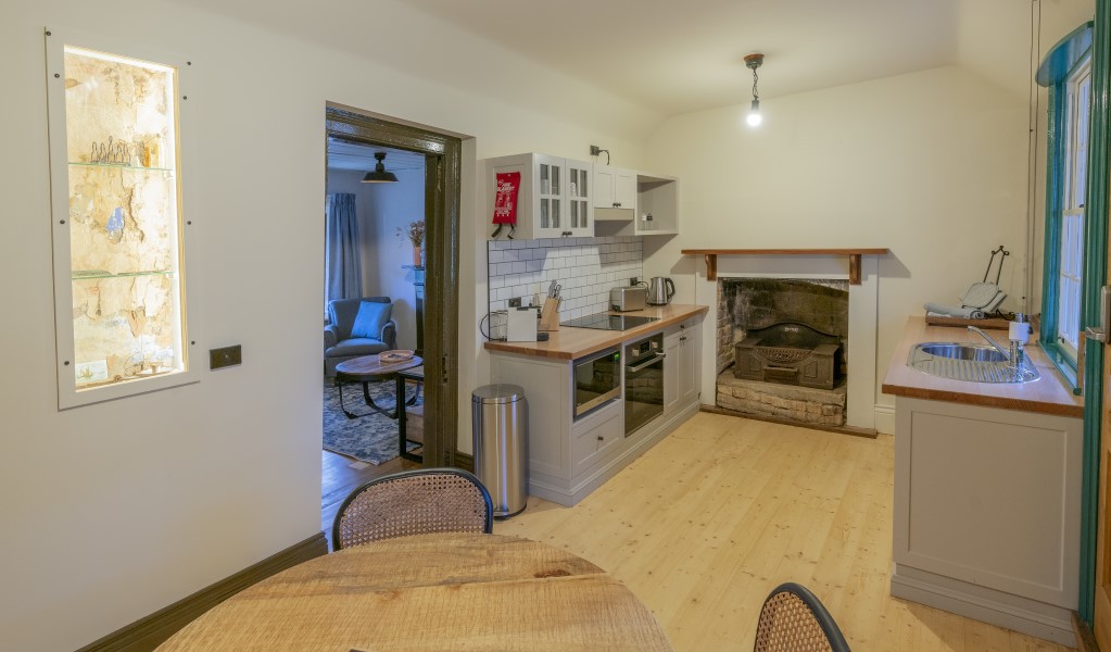 The kitchen and dining area in Fairfax House, Hill End Historic Site. Photo: John Spencer &copy; DPE