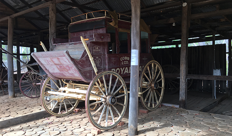 Horse-drawn coach inside a rustic shed at Hospital picnic area, near Bathurst and Mudgee. Photo: Brett Kearins/DPIE