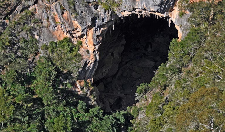 Aerial view of Devils Coach House archway entrance in Jenolan Karst Conservation Reserve. Photo: Kevin McGrath
