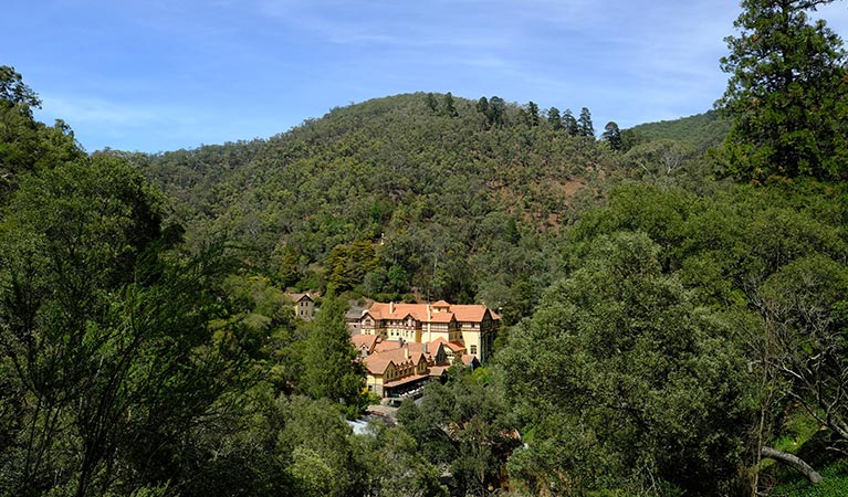 View of Jenolan Caves House from Carlotta Arch walking track, Jenolan Karst Conservation Reserve. Photo: Elinor Sheargold &copy; DPE