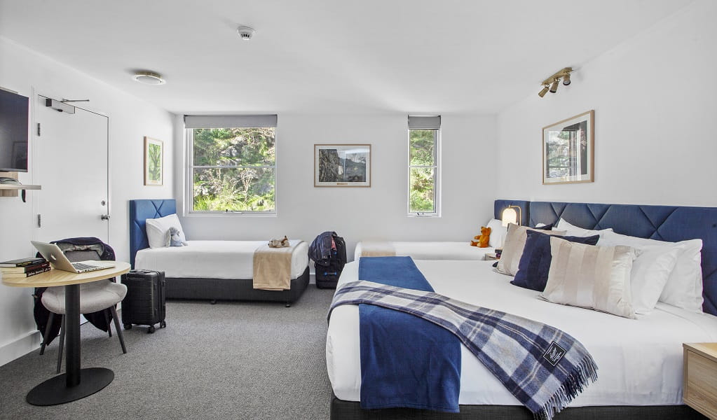 Room configured for a family with 1 double bed and 2 single beds, Jenolan Mountain Lodge, Jenolan Karst Conservation Reserve. Photo: Jenolan Caves &copy; DPE 