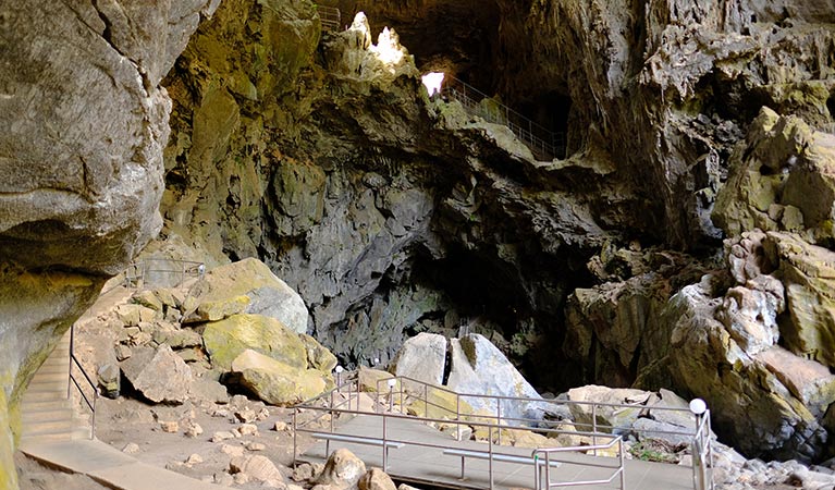 A concrete path passes through Devil's Coach House at Jenolan Caves. Photo: Elinor Sheargold &copy; DPE
