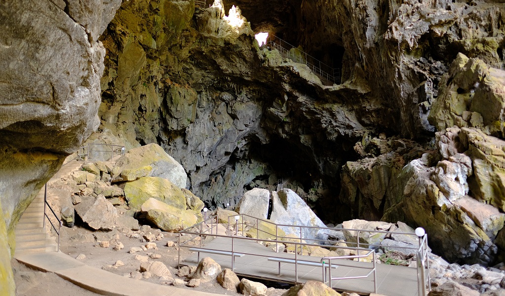 A concrete path passes through Devil's Coach House at Jenolan Caves. Photo: Elinor Sheargold &copy; DPE