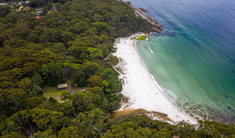 Aerial view of Greenfield Beach picnic area, Greenfield Beach and surrounding bushland. Photo credit: John Spencer &copy; DPIE