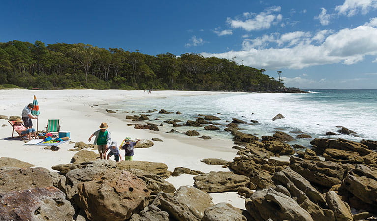 Children play beside their parents at Chinamans Beach, Jervis Bay National Park. Photo: David Finnegan &copy; DPIE