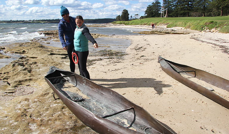 Family exploring the bronze sculptures of Aboriginal canoes in Kurnell area. Photo credit: Natasha Webb &copy; Natasha Webb