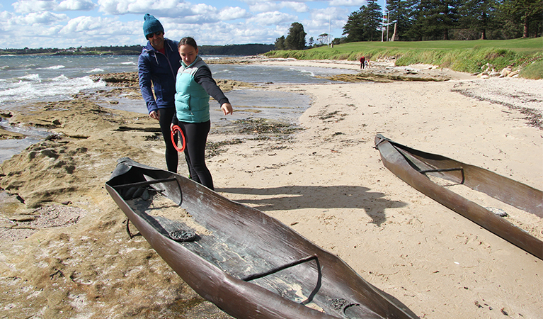 Family exploring the bronze sculptures of Aboriginal canoes in Kurnell area. Photo credit: Natasha Webb &copy; Natasha Webb