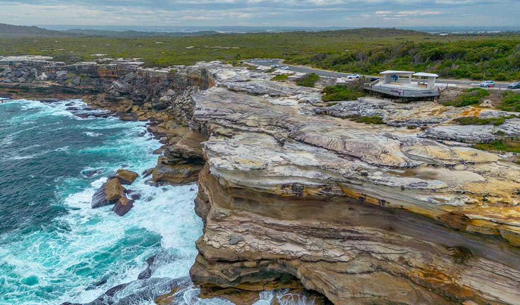 Aerial photo of the whale watching platform at Cape Solander with views beyond to Royal National Park and Sutherland. Photo: John Spencer &copy; DPE