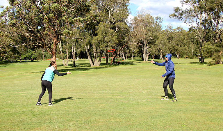 Family playing frisbee at Commemoration Flat picnic area. Photo credit: Natasha Webb &copy; Natasha Webb