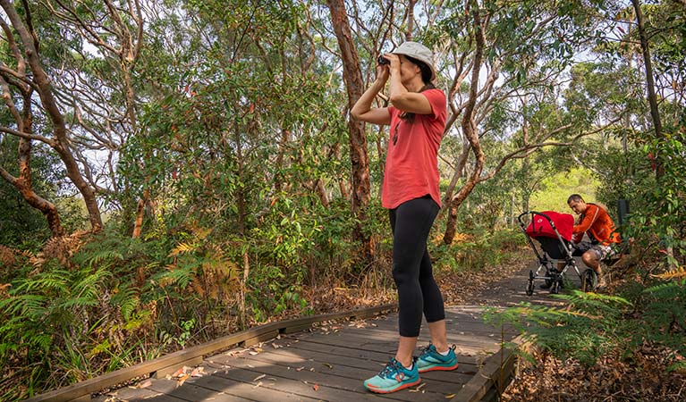 People and their pram stopped along the the Jennifer Street boardwalk, La Perouse area, Kamay Botany Bay National Park. Photo: John Spencer &copy; OEH