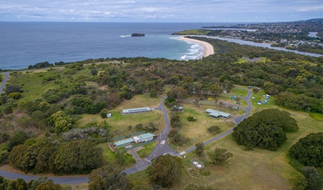 Aerial view of Killalea campground with Minnamurra Beach in the distance. Photo: John Spencer/DCCEEW &copy; DCCEEW