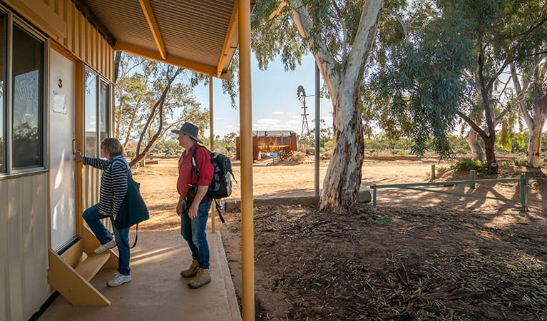 Guests on the porch of their room at Kinchega Shearers Quarters. Photo: John Spencer/DPIE