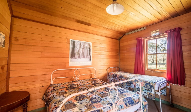 Bedroom in The Pines Cottage, Kosciuszko National Park. Photo: Murray Vanderveer/OEH