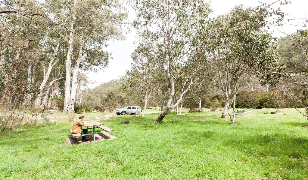 A visitor takes a break at Clover Flat rest area. Credit: Murray Vanderveer &copy; OEH