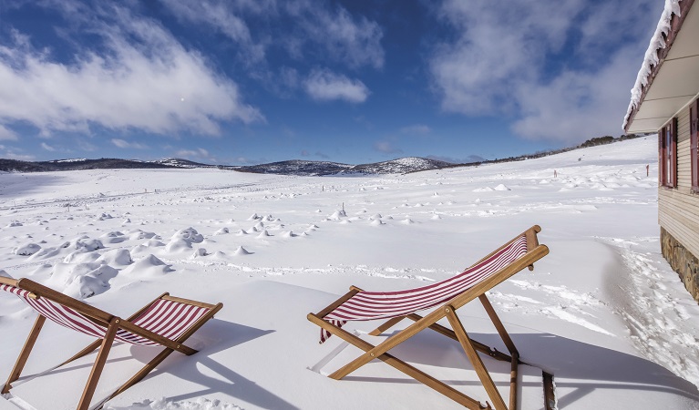 Deck chairs in the snow at Wolgal Hut, Kosciuszko National Park. Photo: Murray Vanderveer