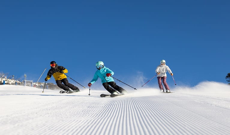 Family enjoying Thredbo skiing program, Kosciuszko National Park. Photo: Thredbo Resort