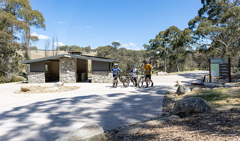 3 cyclists at Thredbo River picnic area, Kosciuszko National Park. Photo: Boen Ferguson &copy; Boen Ferguson