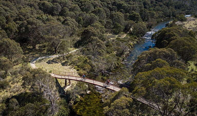 Aerial view of suspension Bridge 4 over Thredbo River, along Thredbo Valley track in Kosciuszko National Park. Photo: Robert Mulally/DPIE