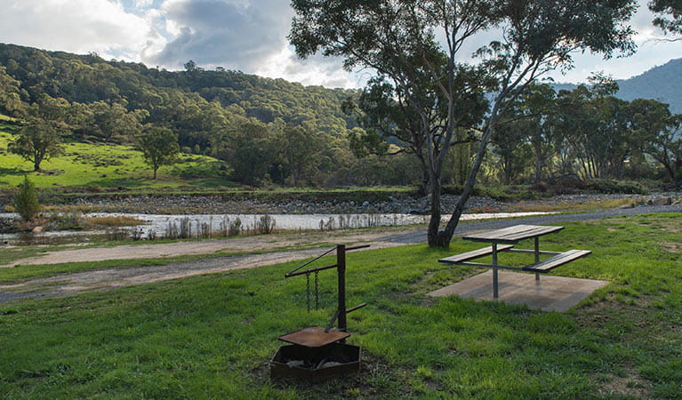 Fire ring and picnic table at Rock Flat campground, Kosciuszko National Park. Photo: John Spencer &copy; DPIE