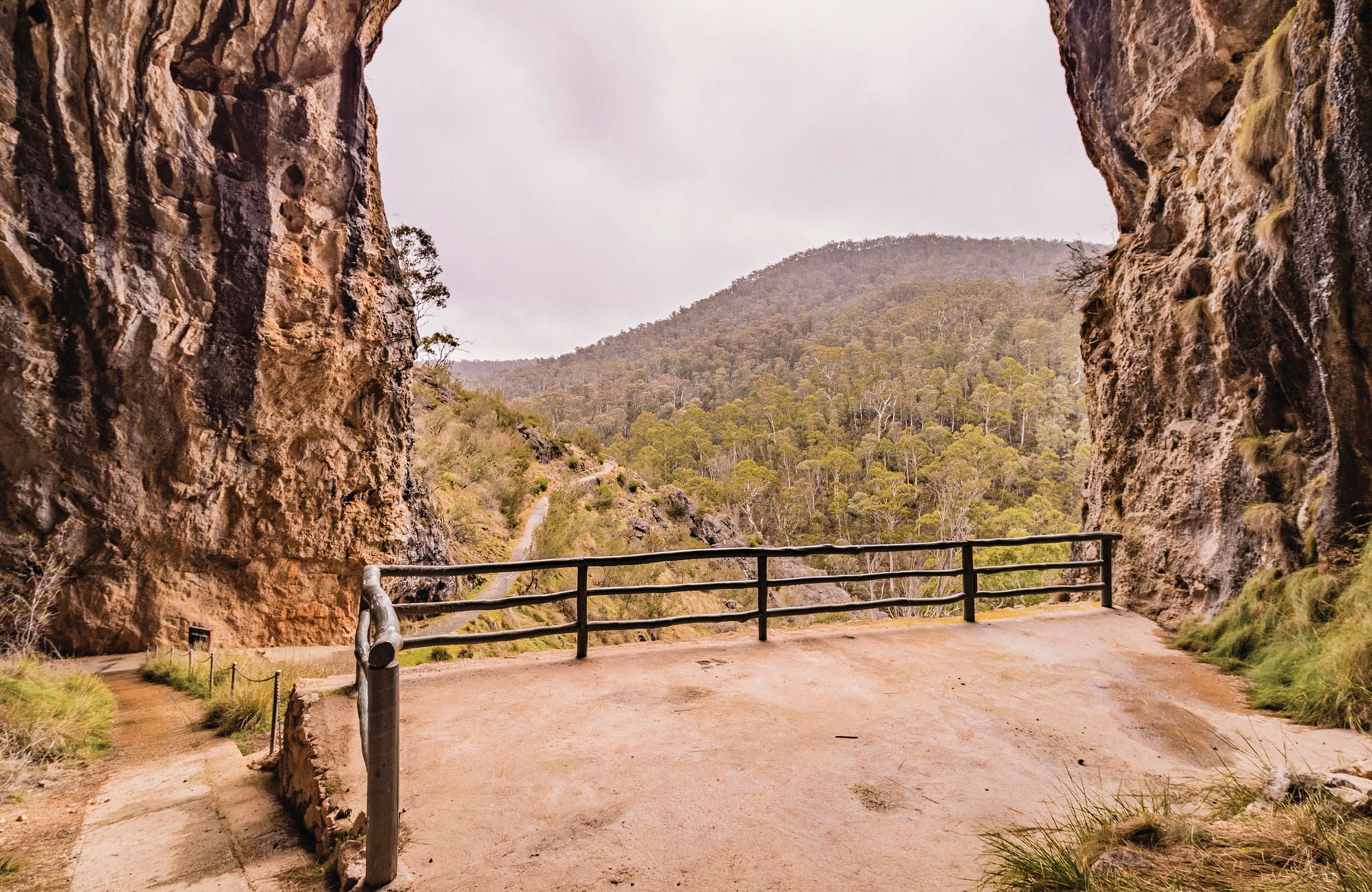 Inside the entrance of North Glory Cave, looking out towards Kosciuszko National Park at Yarrangobilly Caves. Photo: Murray Vanderveer &copy; DPIE