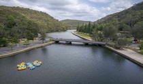 A father and son go fishing next to a marina at Bobbin Head in Ku-ring-gai Chase National Park. Photo: David Finnegan/OEH