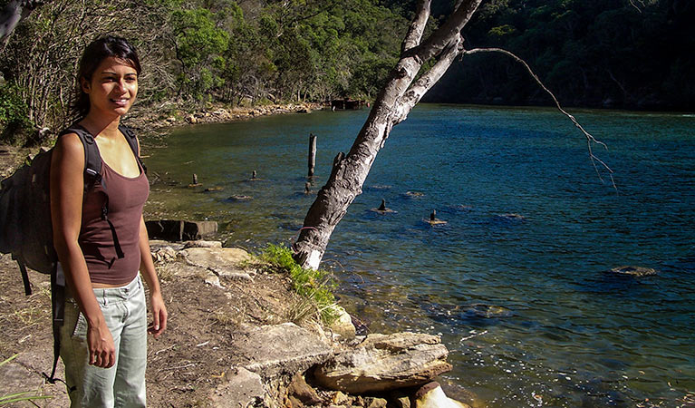 A person enjoy the view along the river, Mount Ku-ring-gai track to Berowra, Ku-ring-gai Chase National Park. Photo: Andy Richards