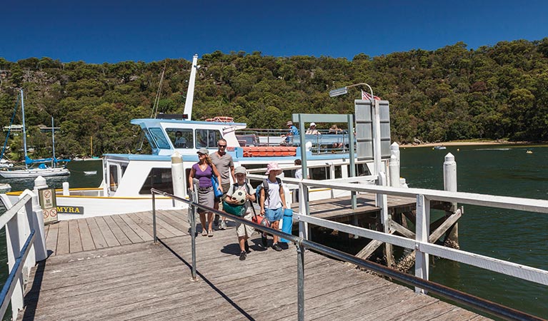 A family arriving at The Basin Jetty. Photo: David Finnegan &copy; OEH