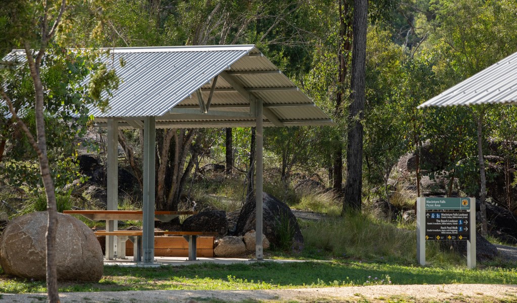 Picnic shelters and directional signage at Macintyre Falls picnic area in Kwiambal National Park. Photo: Simon Scott &copy; DCCEEW