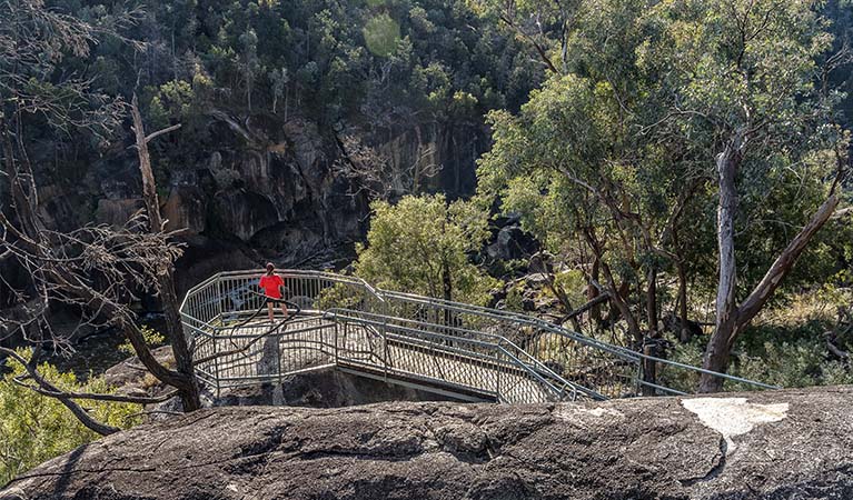 A person at Macintyre Falls lookout in Kwiambal National Park. Photo: DPE