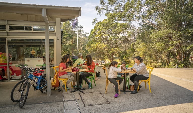 Visitors enjoying a refreshment at Lane Cove National Park Cafe. Photo: John Spencer