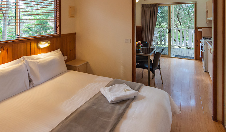 Master bedroom with views of kitchen and dining area at Lane Cove cabins. Photo: Bob Fowler 