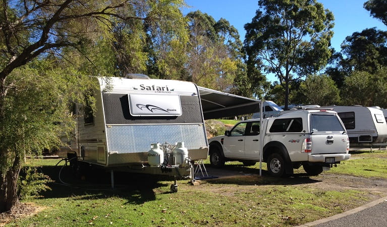 A caravan set up beside a 4WD at Lane Cove caravan park. Photo: Claire Franklin