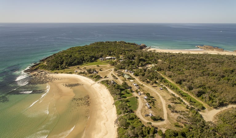 An aerial photo of Point Plomer campground and nearby beach in Limeburners Creek National Park. Photo: John Spencer/OEH