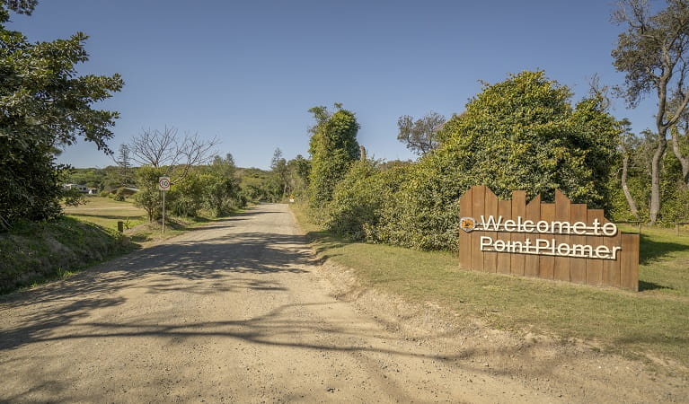Entrance driveway to Point Plomer Campground and Plomer Beach House in Limeburners Creek National Park. Photo: John Spencer/OEH