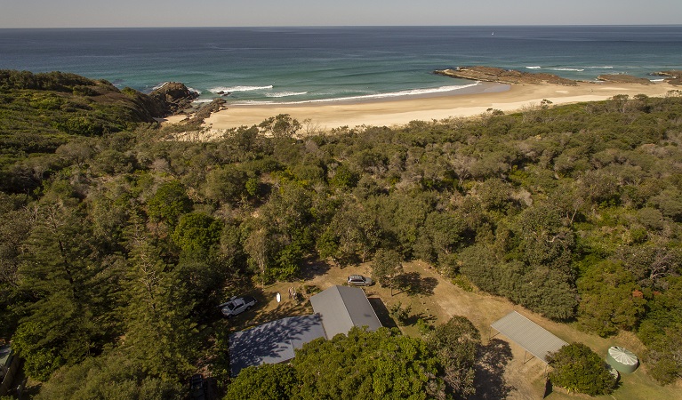 An aerial photo of Plomer Beach House and coastal views at Limeburners Creek National Park. Photo: John Spencer/OEH