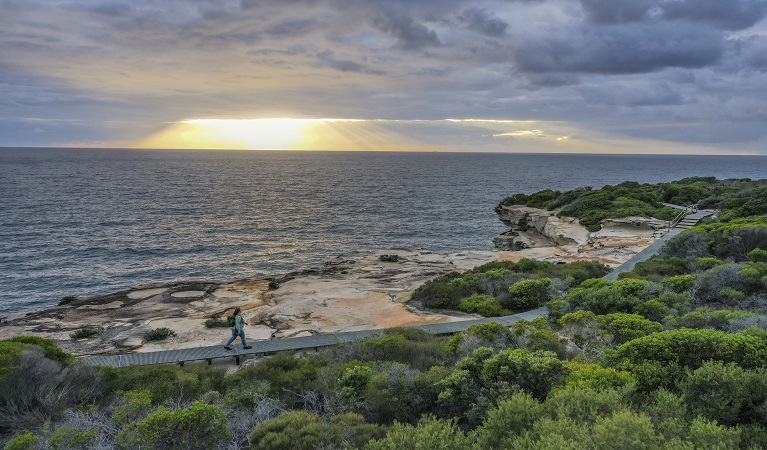 Visitor walking on Boora Point walking  track. Photo: John Spencer &copy; DPE