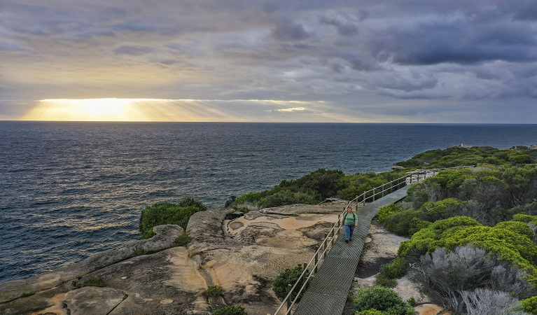 Ocean and walking track at dusk, Boora Point walking track. Photo: John Spencer &copy; DPE