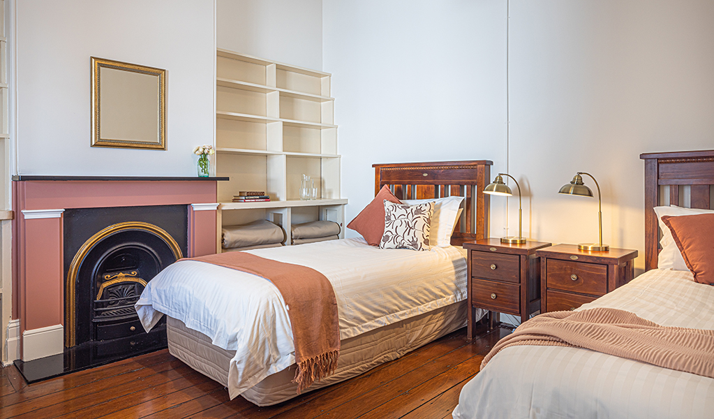 Twin beds in a bedroom at Montague Island Assistant Lighthouse Keeper's Cottage. Photo: David Rogers/DPE