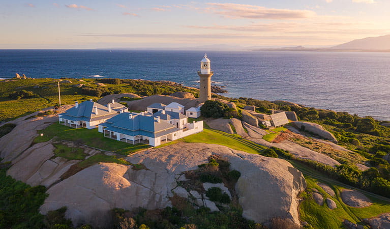 Aerial view of Montague Island lighthouse and cottage at sunset. Photo: Daniel Tran/OEH
