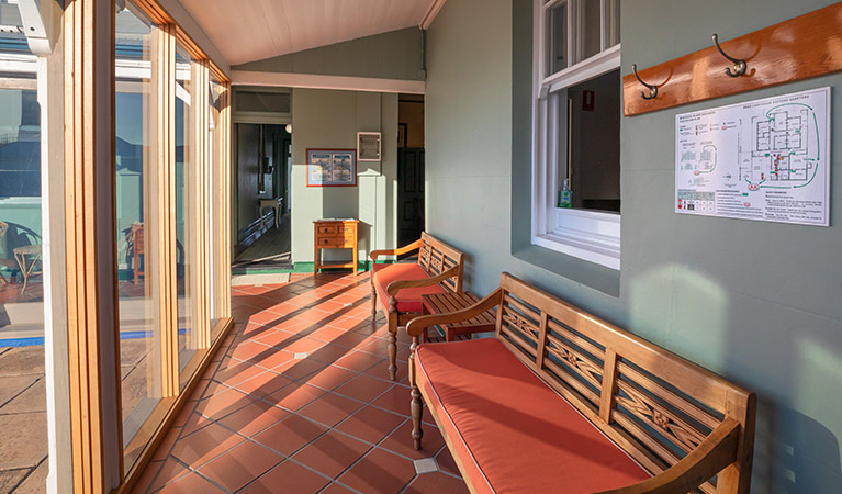 Bench seats on the verandah at Montague Island Head Lighthouse Keepers Cottage. Photo: Daniel Tran/OEH