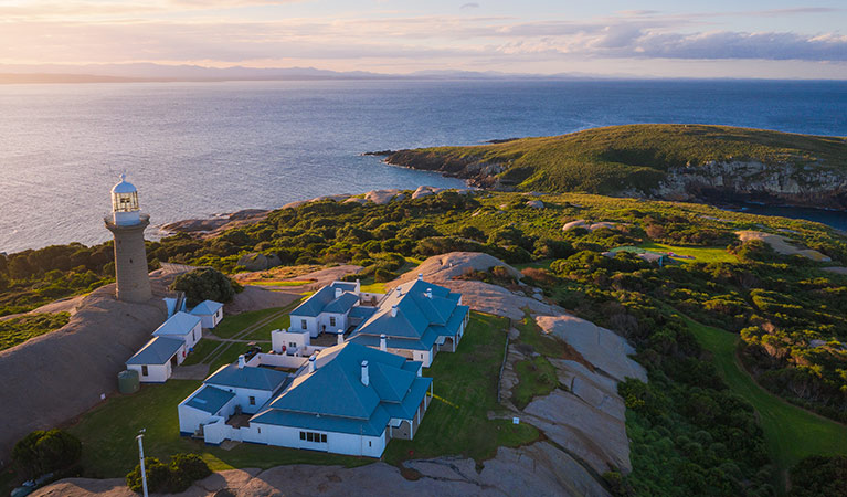 Aerial view of Montague Island Lighthouse and cottages at sunset. Photo: Daniel Tran/OEH