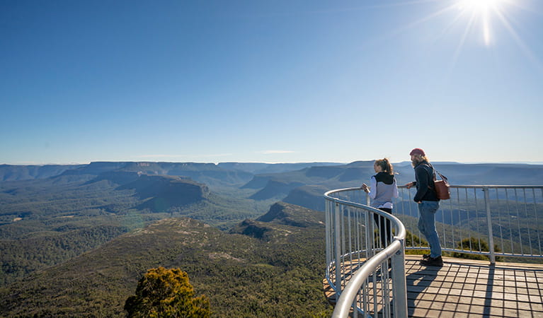 People on the lookout, Pigeon House Mountain Didthul walking track, Morton National Park. Photo credit: John Spencer &copy; DPIE