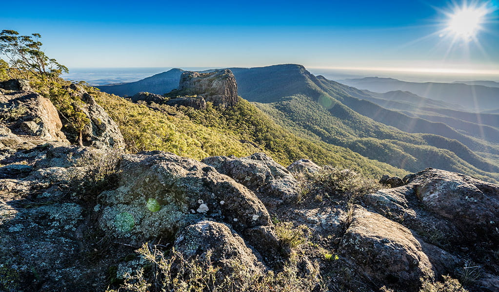 View of rugged ridges and distant valleys in Mount Kaputar National Park. Photo Credit: Simone Cottrell  &copy; DPIE