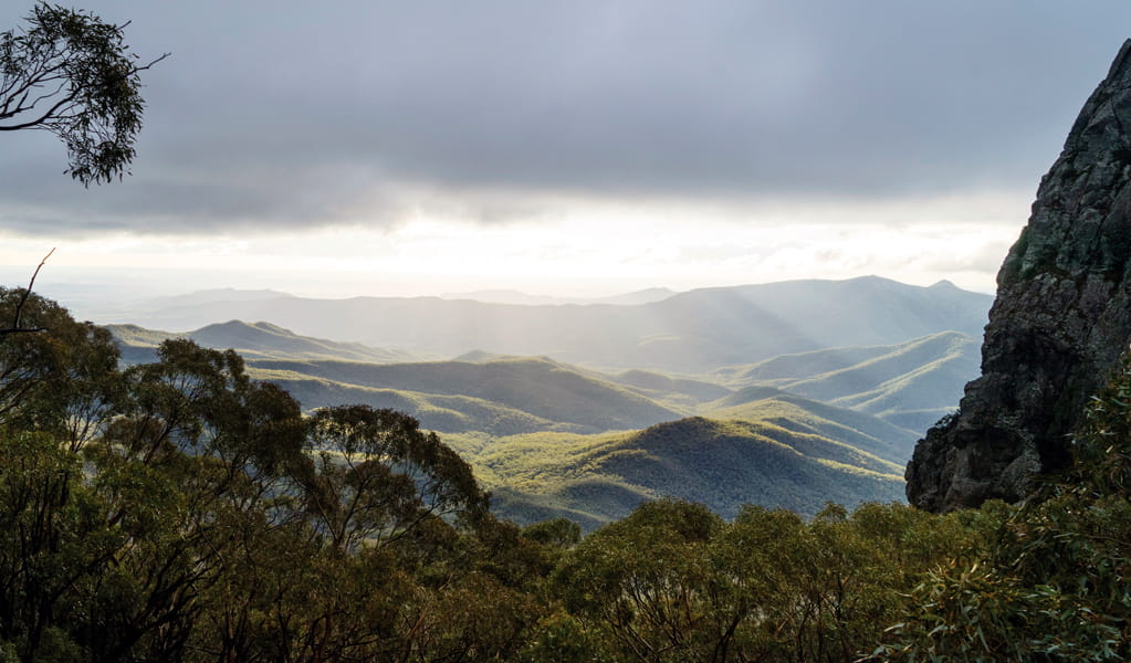 Beautiful view over hills from West Kaputar Rock lookout, Mount Kaputar National Park. Photo: Simone Cottrell &copy; DCCEEW