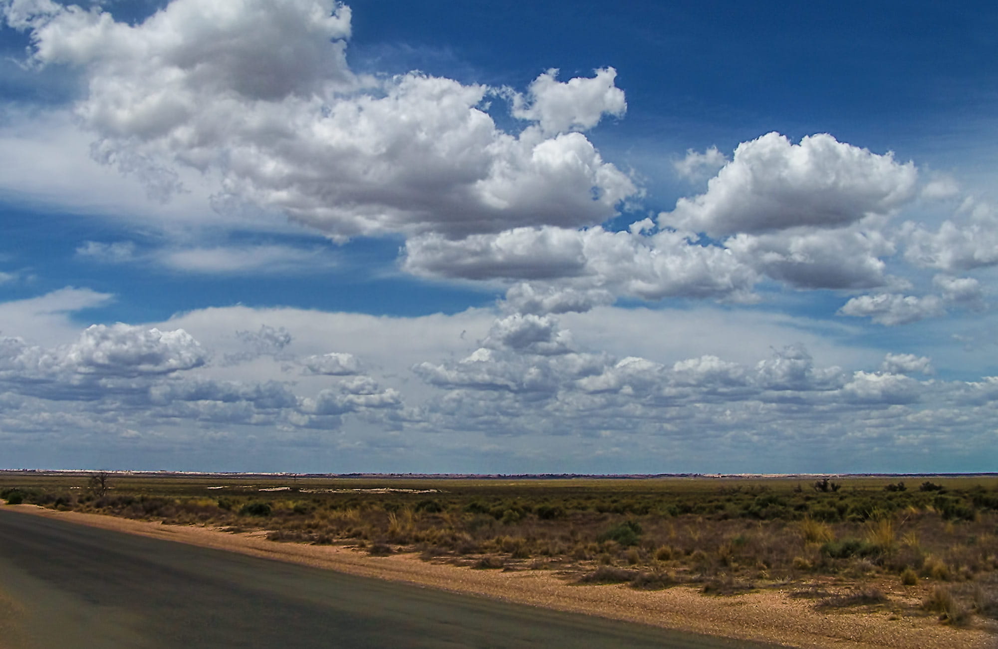 Long outback road with a big sky, Mungo National Park. Photo:OEH 