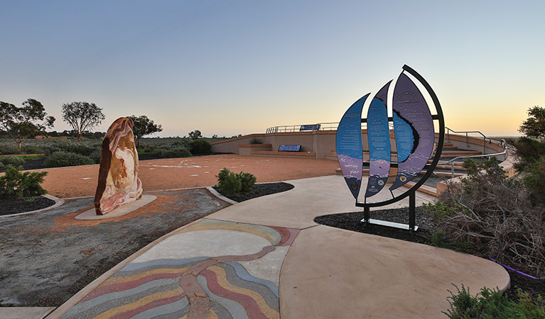 Interpretive signs and art displays outside Mungo Visitor Centre in Mungo National Park. Photo: Corey Brown &copy; OEH and Vision House Photography